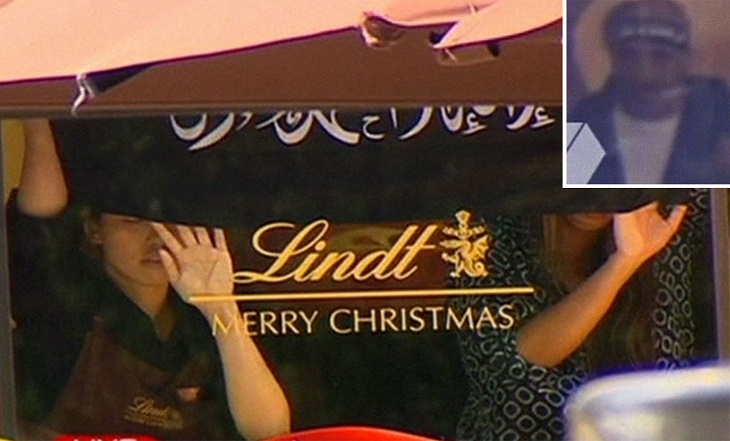 Sydney siege: Hostages held in Lindt cafe