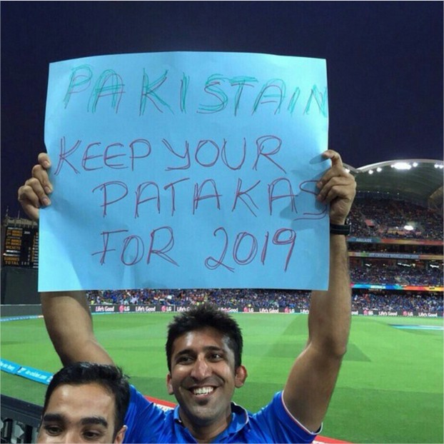 Ind Vs Pak Match Photos- man holding chart