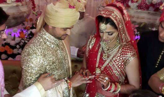 Suresh Raina wearing ring for Priyanka Chaudhary