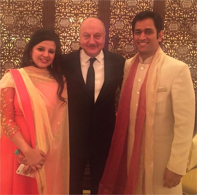 Sakshi and MS Dhoni wth Anupam Kher in Suresh Raina marriage