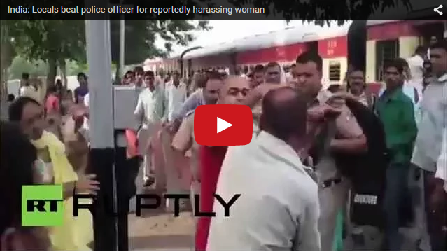 police beaten up by locals for harrassing woman