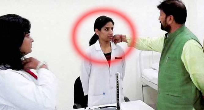 BJP minister touches collar of a woman doctor 
