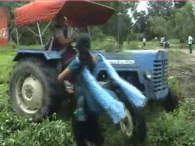 lady don moves her tractor over two innocent womens