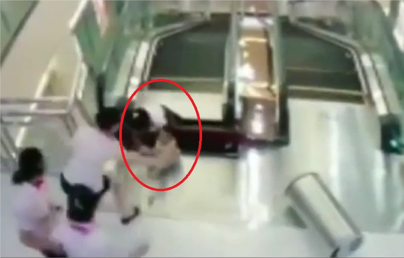 A Mother in China Fell to Her Death Inside an Escalator but Somehow Saved Her Toddler