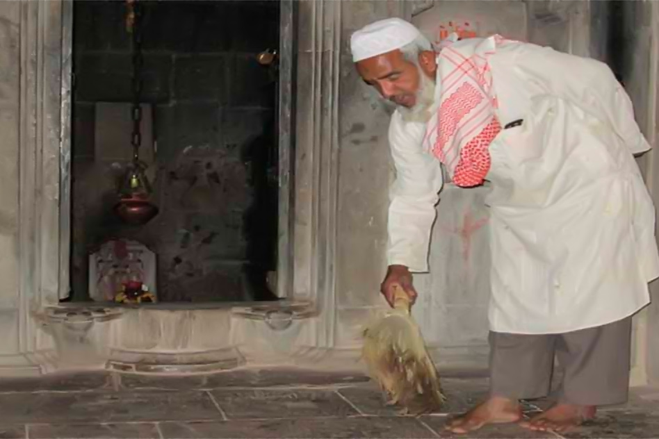 Zahir sweeping the premises of Shiva temple