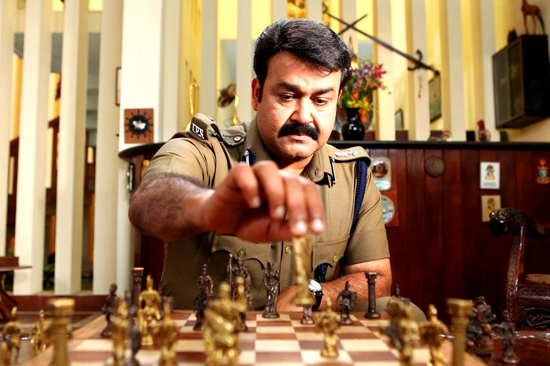 mohanlal Nuvve Na Pranamani police officer tough cop role 