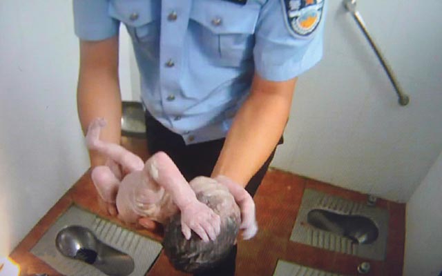 Newborn baby pulled alive from toilet