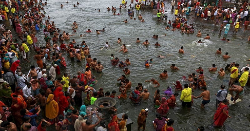 Tens of thousands take holy dip at India's Kumbh Mela