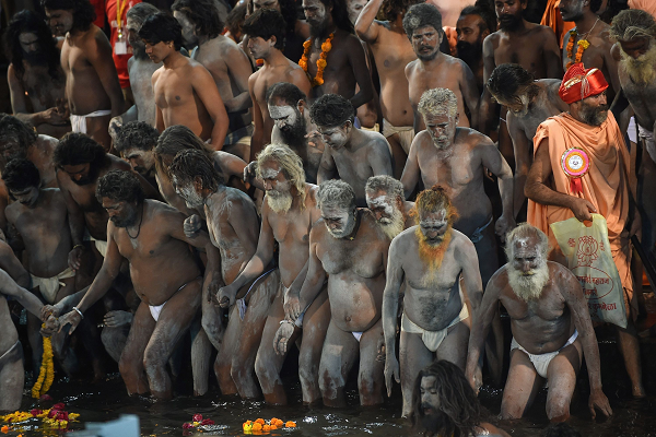 Tens of thousands take holy dip at India's Kumbh Mela