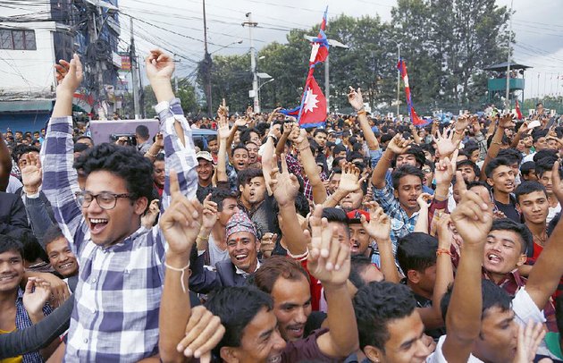 Nepalese celebrate the announcement of new constitution