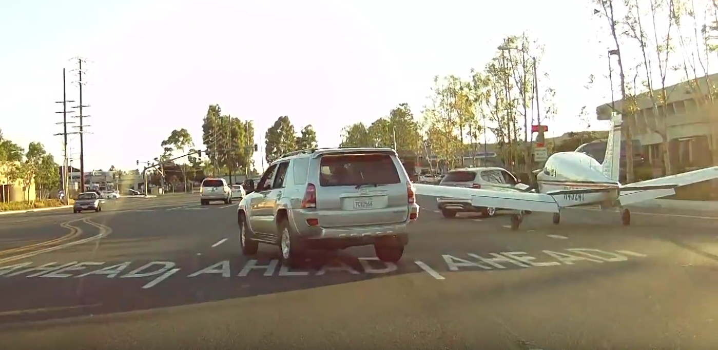 small-airplane-lands-on-irvine-street-causes-drivers-to-gasp-video-100285_1 (1)