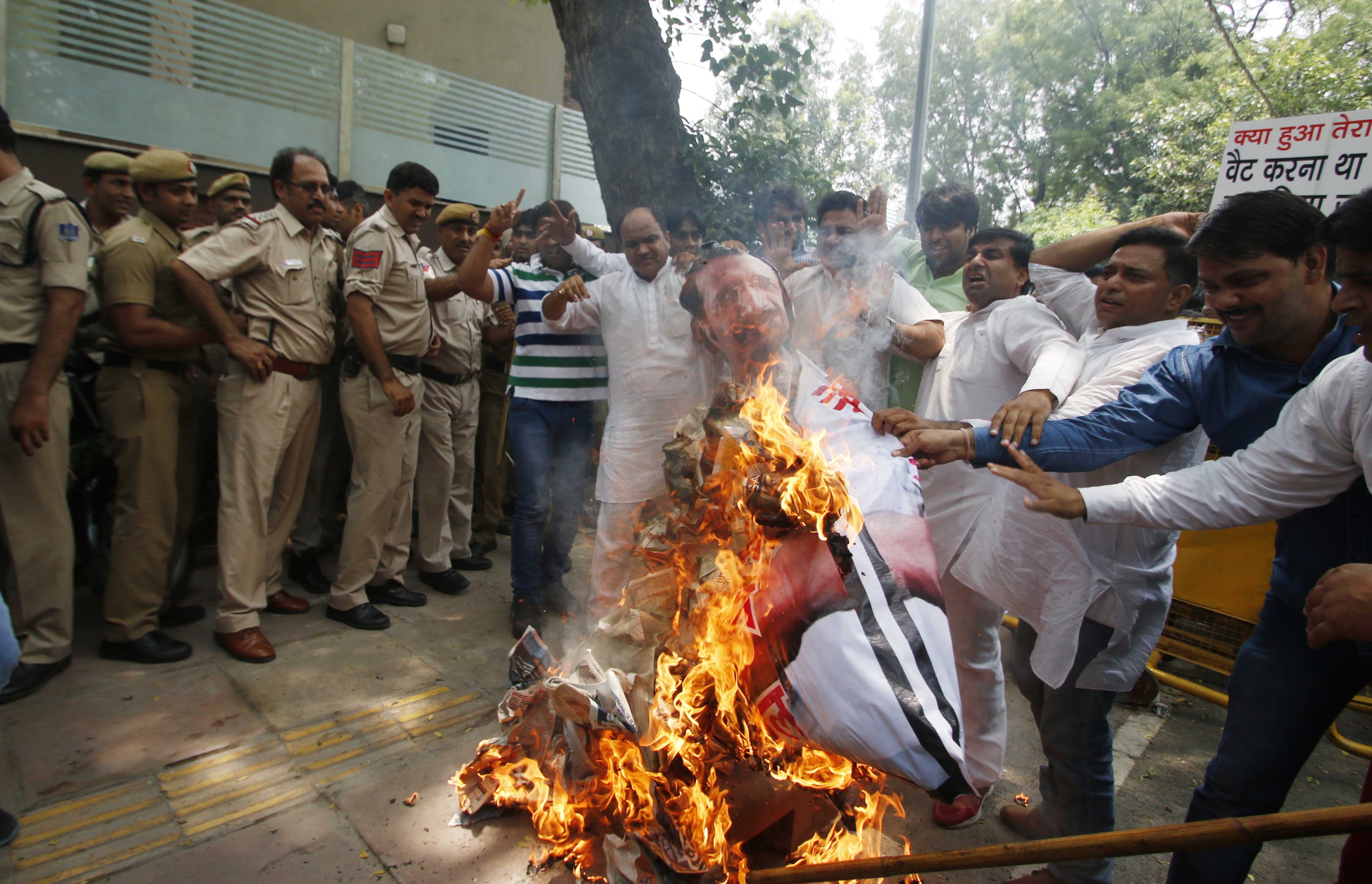 Youth Congress workers protest against Delhi Chief Minister Arvind Kejriwal near his residence in New Delhi