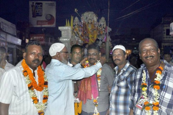 muslim man salim celebrating durga puja in raigarh