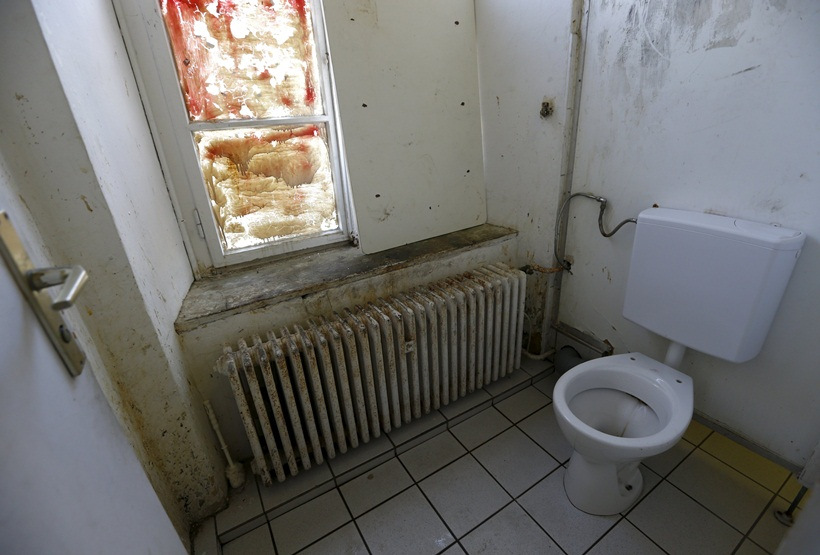 A toilet is seen in a hostel for asylum seekers in Augsburg near Munich, southern Germany