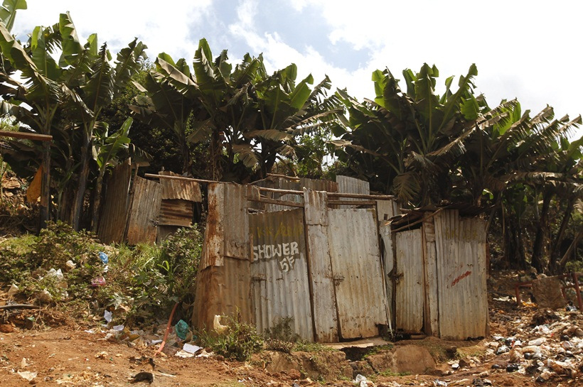 A public toilet made of rusty sheets of metal stands in Gatwekera village in Kibera slum in Nairobi, Kenya