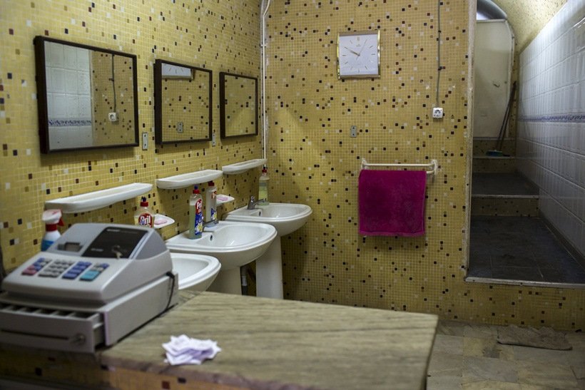 A cash register sits on a table in a ladies' public toilet in downtown Algiers, Algeria October 17, 2015.