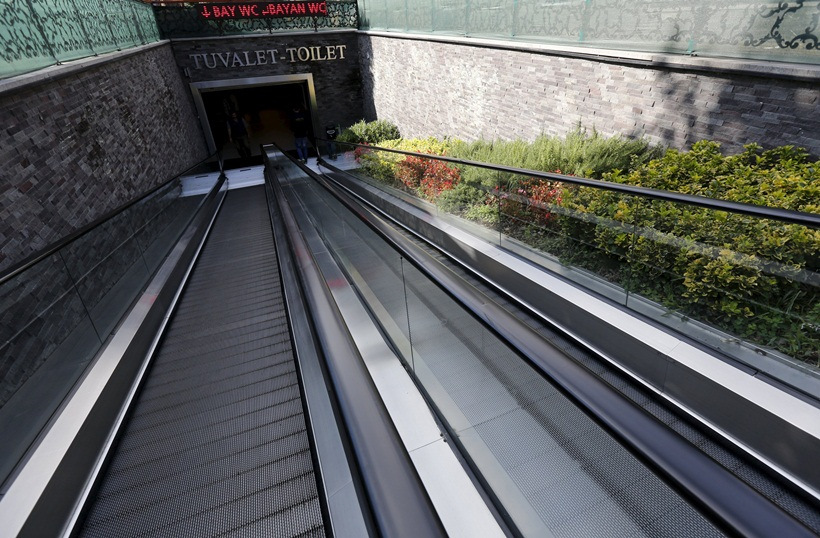 The entrance to a public toilet with escalator ramps is seen in Istanbul, Turkey, October 9, 2015. 