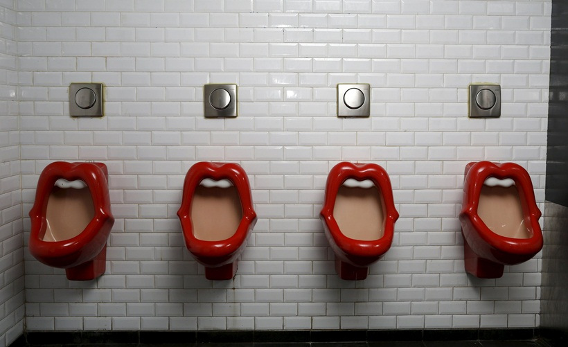 Urinals inspired by the Rolling Stones lips and tongue logo are seen in a bar in Paris