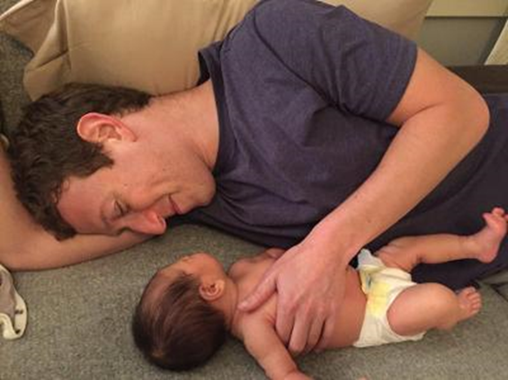 Mark Zuckerberg With his Baby Maxima Lying on floor