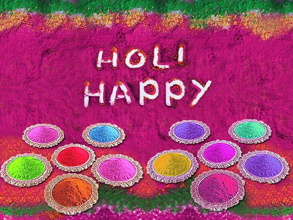 Happy-holi-wallpaper with colours in the plates