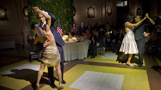 Obama and Michelle dancing