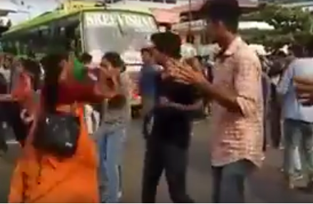 Angry Woman Slaps A Girl During Flash Mob For Stopping Traffic (2)