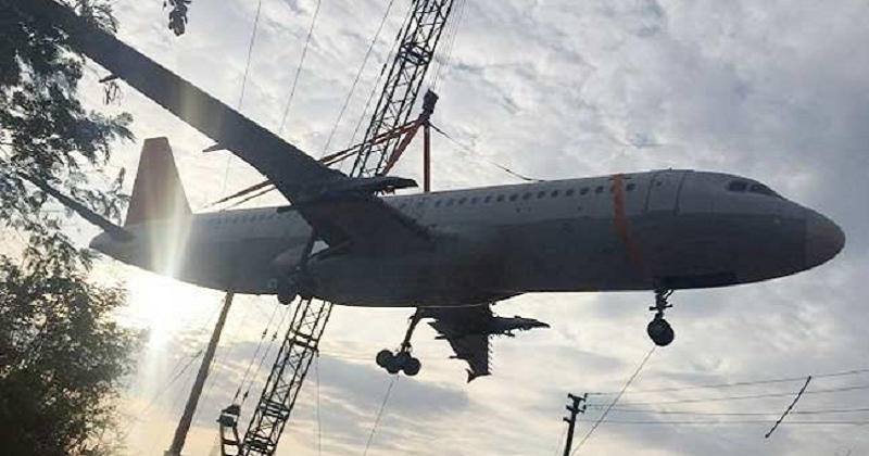 Crane Carrying an Air India Defunct Aircraft Loses Its Balance (6)