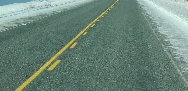 Solid yellow line with broken yellow line