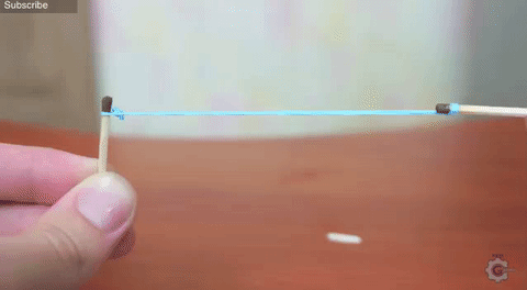 How to Light a Match With Just a Rubber Band (And a Little Practice)