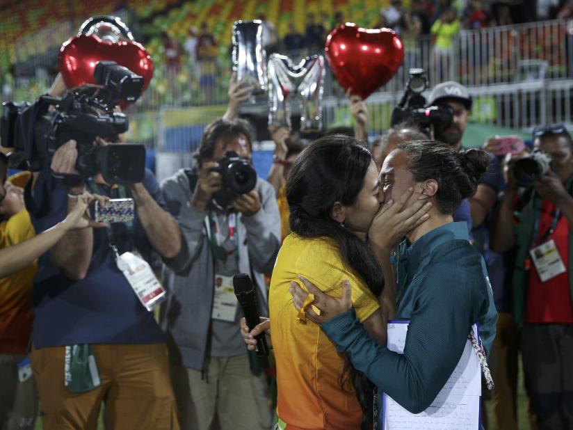 Lovers kissing after proposal