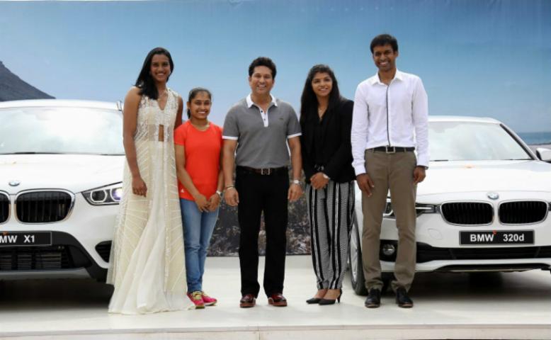 Sachin presenting BMW cars to Olympic champions