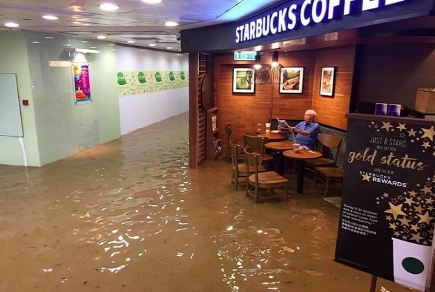 guy-casually-sat-in-a-starbucks-during-a-flood