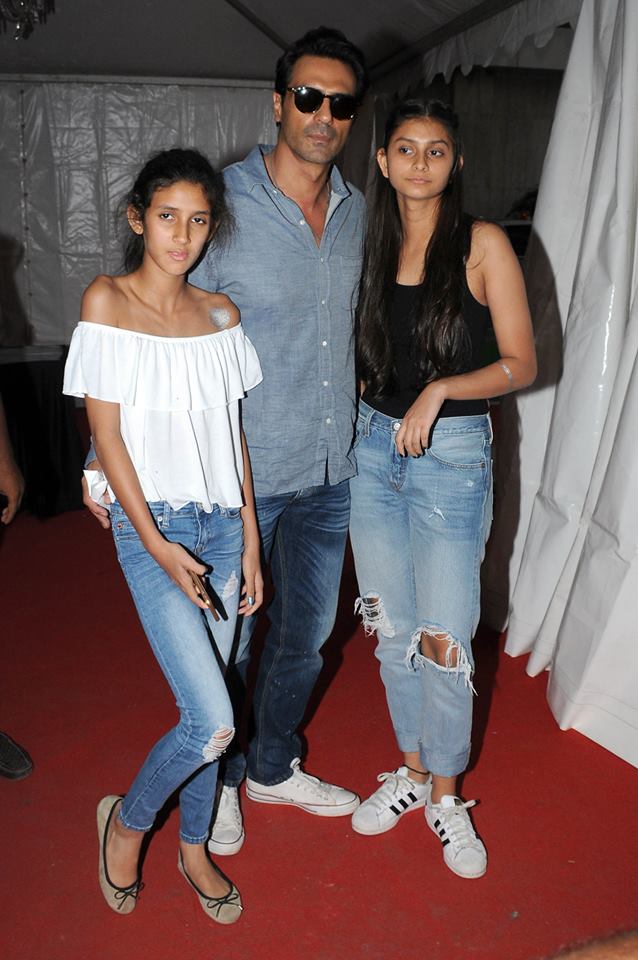 Arjun Rampual with his daughters