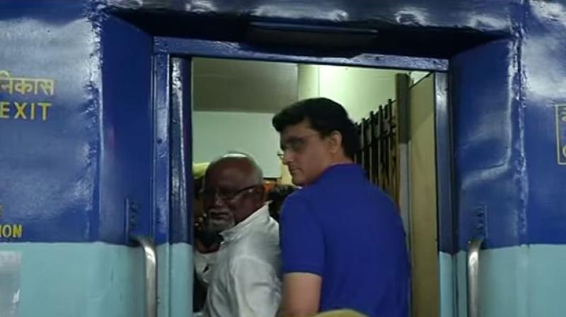Ganguly traveling in a train