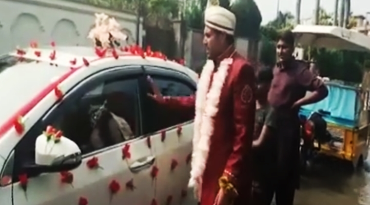 funny pakistan viral videos, groom pushing car in flood waters pakistan viral, funny viral videos from pakistan, groom stuck in waters in pakistan, groom stuck in flood waters pakistan video viral, indian express, indian express news