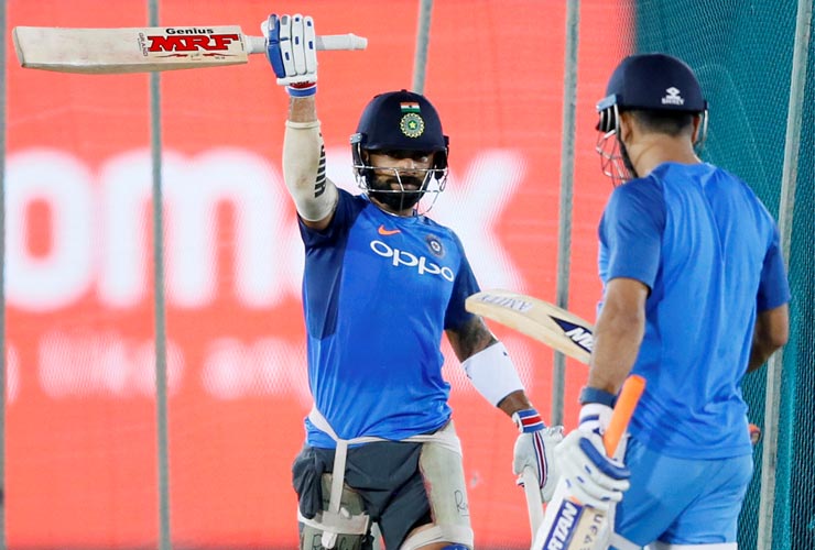 virat-kohli-greets-ms-dhoni-with-the-iconic-helicopter-shot-gesture-in-the-nets
