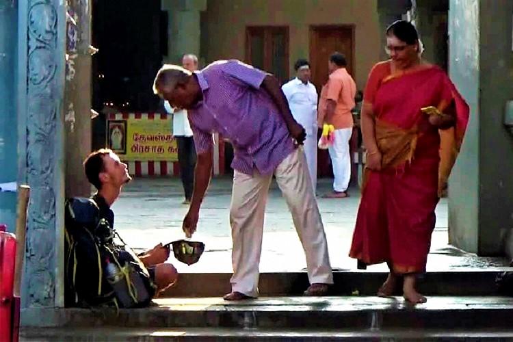 russian tourist begging in india
