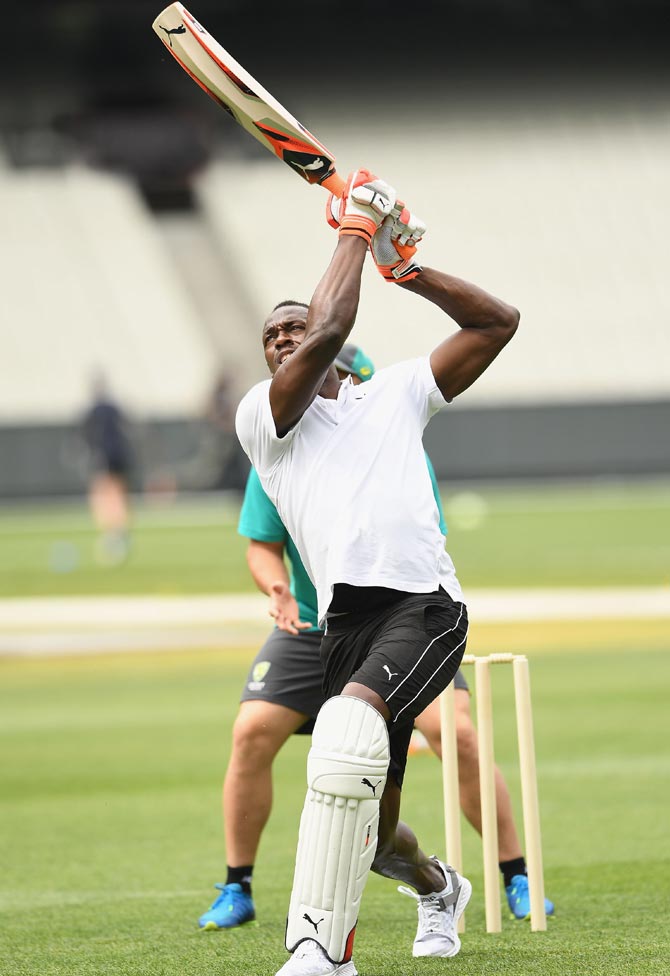 Usain Bolt joins Australian cricket