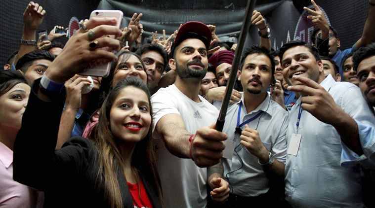 Fans taking Selfie with Virat