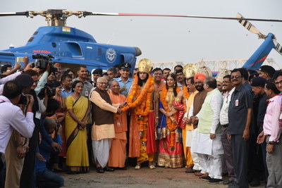 adityanath welcoming rama sita and laxman at helipad