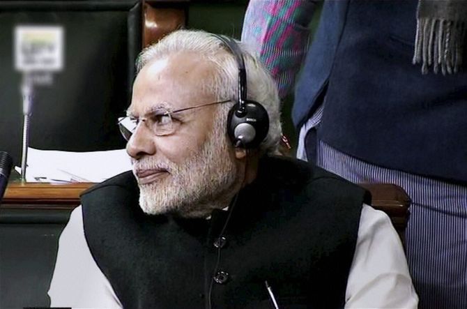 MODI WEARING HEADPHONES IN LOK SABHA