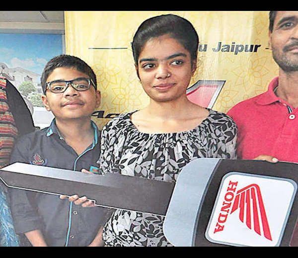 kids gifting honda activa to their dad