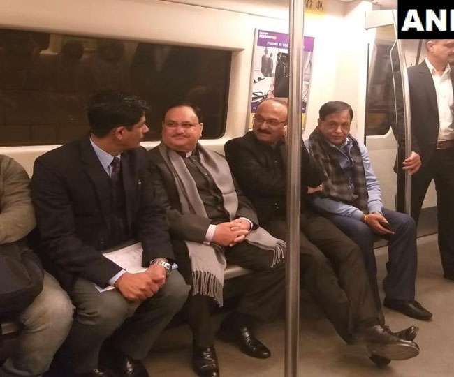 Minister JP Nadda takes the Delhi Metro