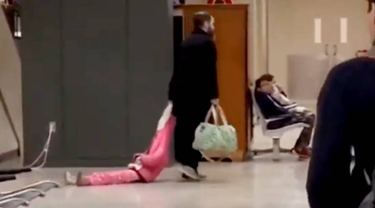 dad drags daughter, dad drags daughter airport viral video, viral video, child dragged, father drags child at airport, funny video