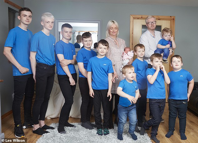 Picture of baby Cameron with her 10 brothers! 