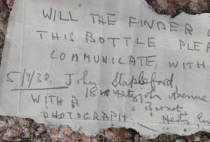 Image result for Man finds 82-year-old message in a bottle on the beach