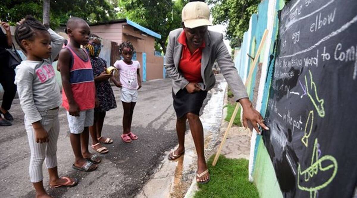 Jamaican Teacher Uses Walls As Blackboards To Teach